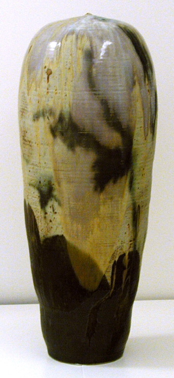 a large stoneware oblong form with earth tones